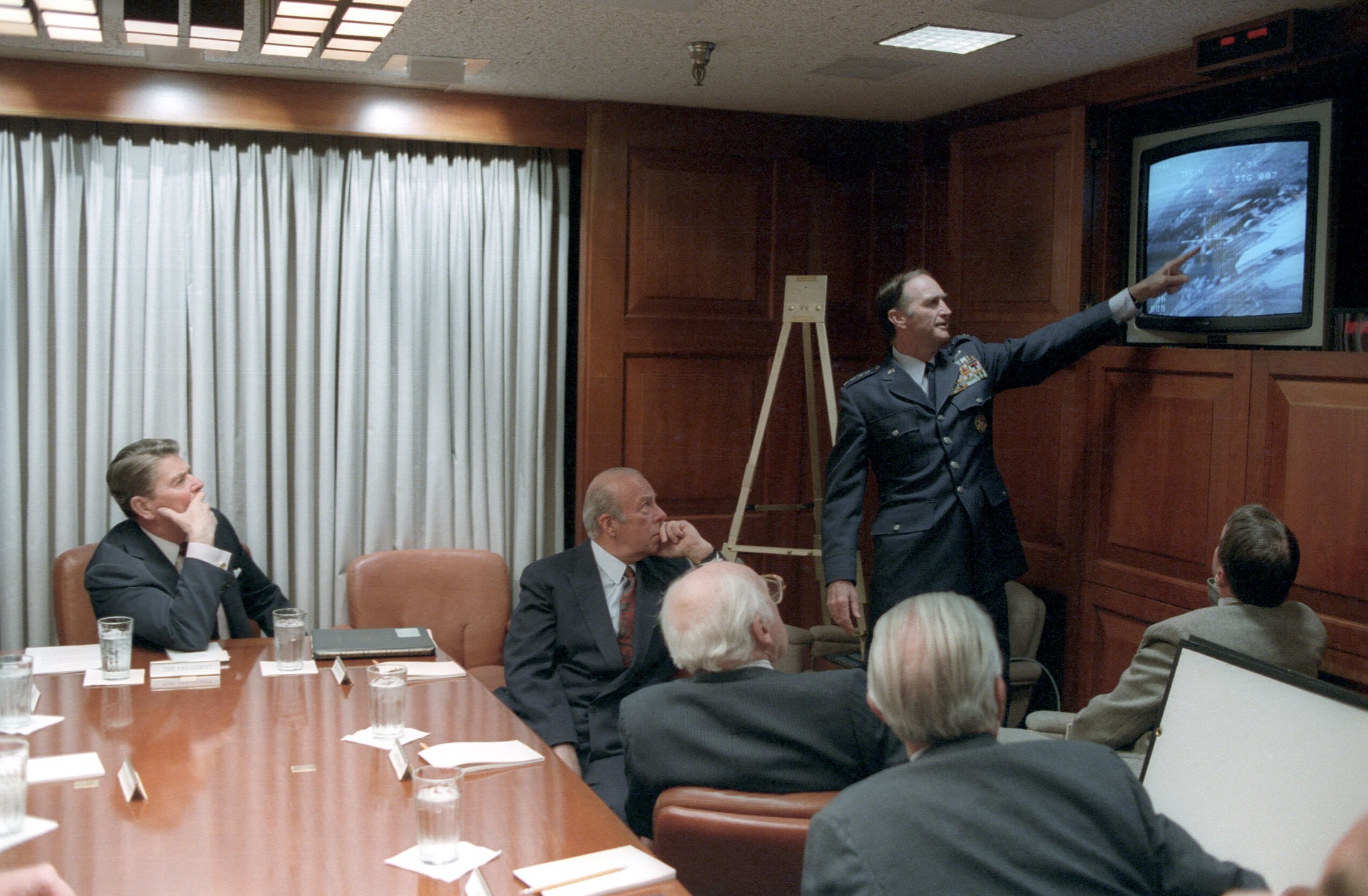 President Ronald Reagan is briefed on events taking place in Libya in the White House Situation Room 